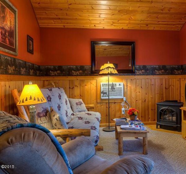 Living Room- Futon makes out to bed to sleep 2 