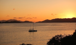 Watch the sunrise over St. John while savoring your favorite morning beverage.