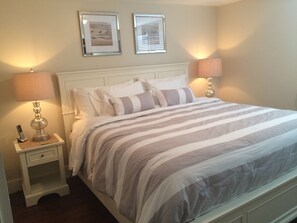 Master Bedroom with King Bed, TV and Ensuite Bathroom