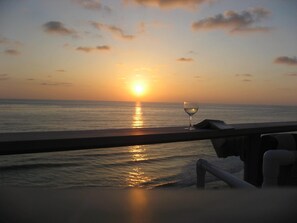 Balcony sunset reading a good book and glass of wine?