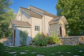 The beautiful lawn and garden surround the house