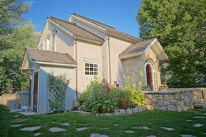 The beautiful lawn and garden surround the house