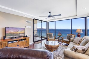 Living room opens onto lanai, and has incredible views any time of day!