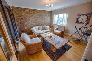 Secondary living area with large flat screen tv and nice mountain views
