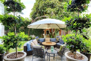Fireplace seating in backyard