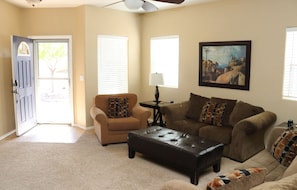A screened storm door allows guests to enjoy the fresh mountain air.