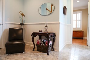 Your foyer— the bronze statue is a nod to the property’s history and name...