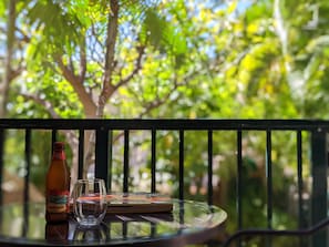 Relax on the lanai under the palm trees!