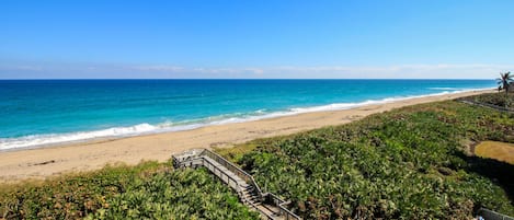 Enjoy watching and listening to the waves from your private balcony