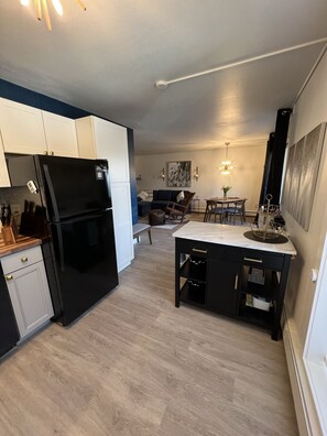 From the kitchen into the dining and living area.