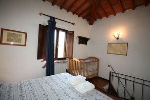 Fattoria di Argiano - comfortable bedroom from baby crib