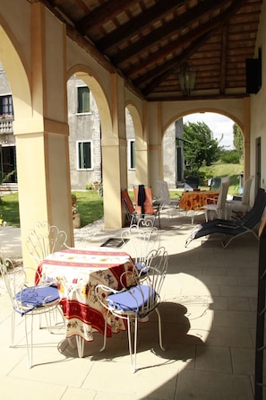  interior view of the Portico  with tables and chairs available for guests