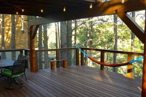 Peeled Ponderosa Pine Poles support the Large Balcony and create the perfect ambiance.