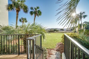Walk out the back door to the pool and beach boardwalk