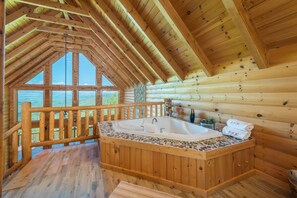 Imagine soaking in the Jacuzzi spa overlooking the Smokey Mountains