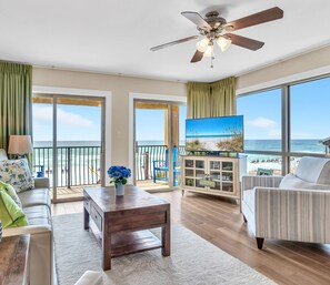Welcome! Enjoy the beach view from every seat in this Coral Reef end unit.
