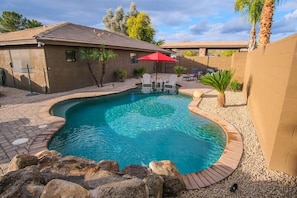 Beautifully Landscaped Backyard with Rock Fountain