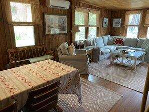 True beach home..Great room with dining table and plenty of seating.