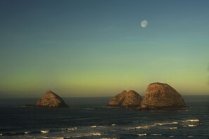 Full moon with view of Oceanside's Three Arch Capes from the unique tree deck