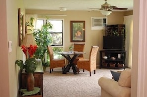Living Room with Flat Screen TV (ocean view through sliding doors to the right)