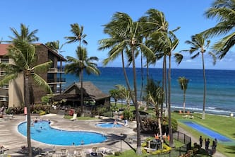 Stunning Ocean Views-Top Floor-2 bedroom/Family friendly- AC throughout!