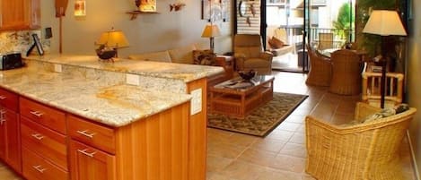 Kitchen has been totally remodeled-Living area opens up to the extra large lanai