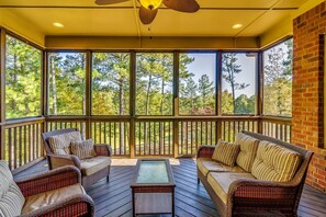 Enjoy a glass of wine, a few beers or your morning coffee while relaxing on our "tree-top" screened porch.