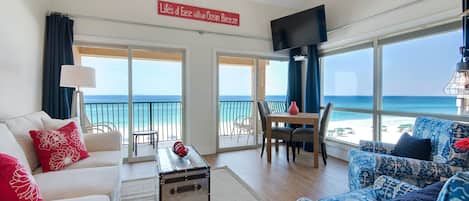 Beautiful corner unit with floor to ceiling view of the beach