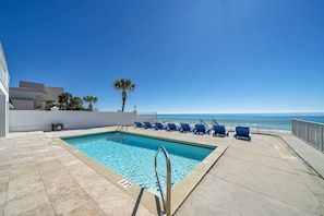 Enjoy Sun Filled Days Lounging Around Your Large Private Pool