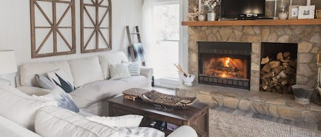 Cozy living room for relaxing by the fireplace or watching a movie