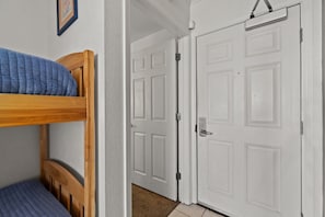 Foyer entry into twin bunks and master bedroom