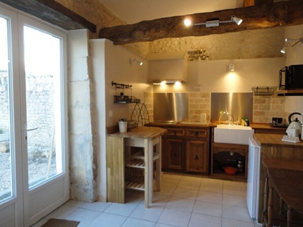 The kitchen alcove - well equipped to cook a your finds from the local markets