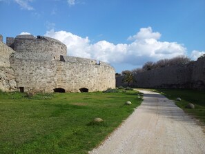 the moat just opposite the house