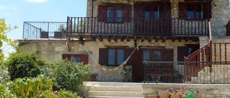  house with veranda from garden  