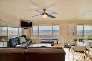 View from kitchen looking at living room and full ocean views