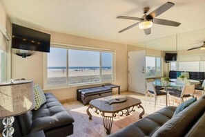 View of living room, boardwalk door and amazing full ocean view