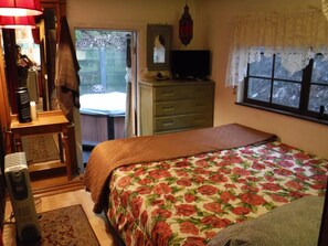 Back bedroom looking out into hot tub yard 
