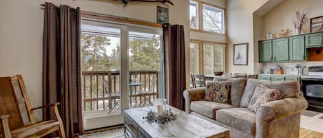 Vaulted ceilings on main level, view towards kitchen.