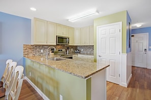 Well-equipped kitchen with plenty of counter space.