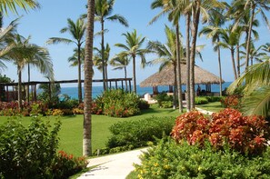 Beautifully landscaped grounds with Palapa Bar