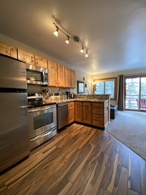 Brazilian Pecan Floors, Knotty Alder & Granite