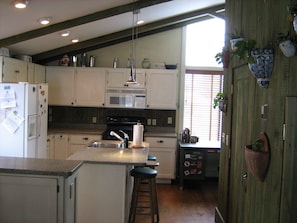 Kitchen with island and cabinets