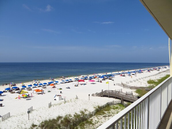 Enjoy the peaceful sound of the waves as they crash on the shore just feet below