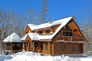 A warm cabin on a beautiful winter's day. 