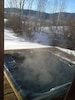 Private outdoor hot tub with park views and Howelson Hill