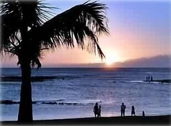 Poipu beach sunset - minutes away via a garden path