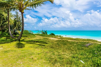 The beach side in front of the property .