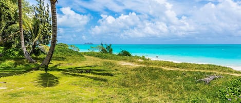 The beach side in front of the property .