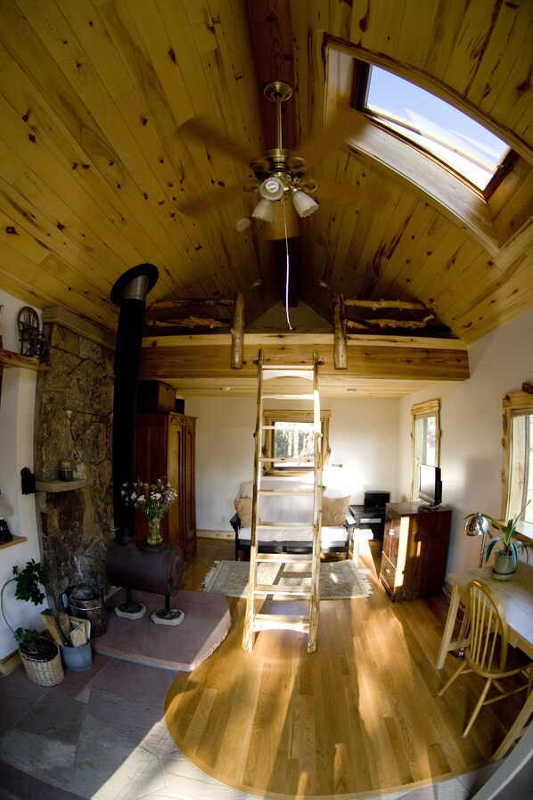 Living Room with Sleeping Loft Above