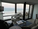 The Living Room gives you a relaxing view of the beach,  sky , and surf!